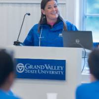Woman speaking at podium